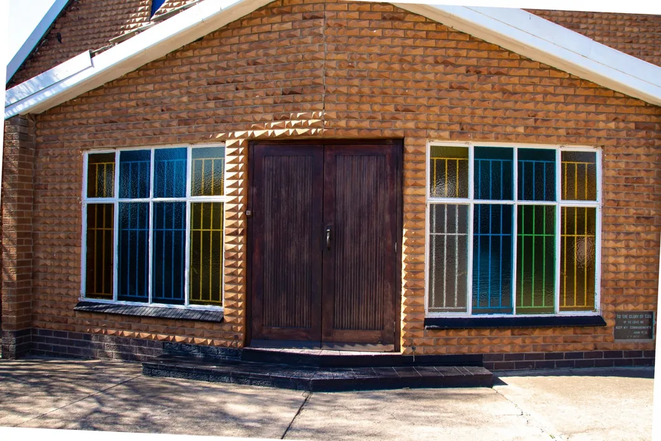 Main entrance and stained glass windows at Edenvale SDA Church